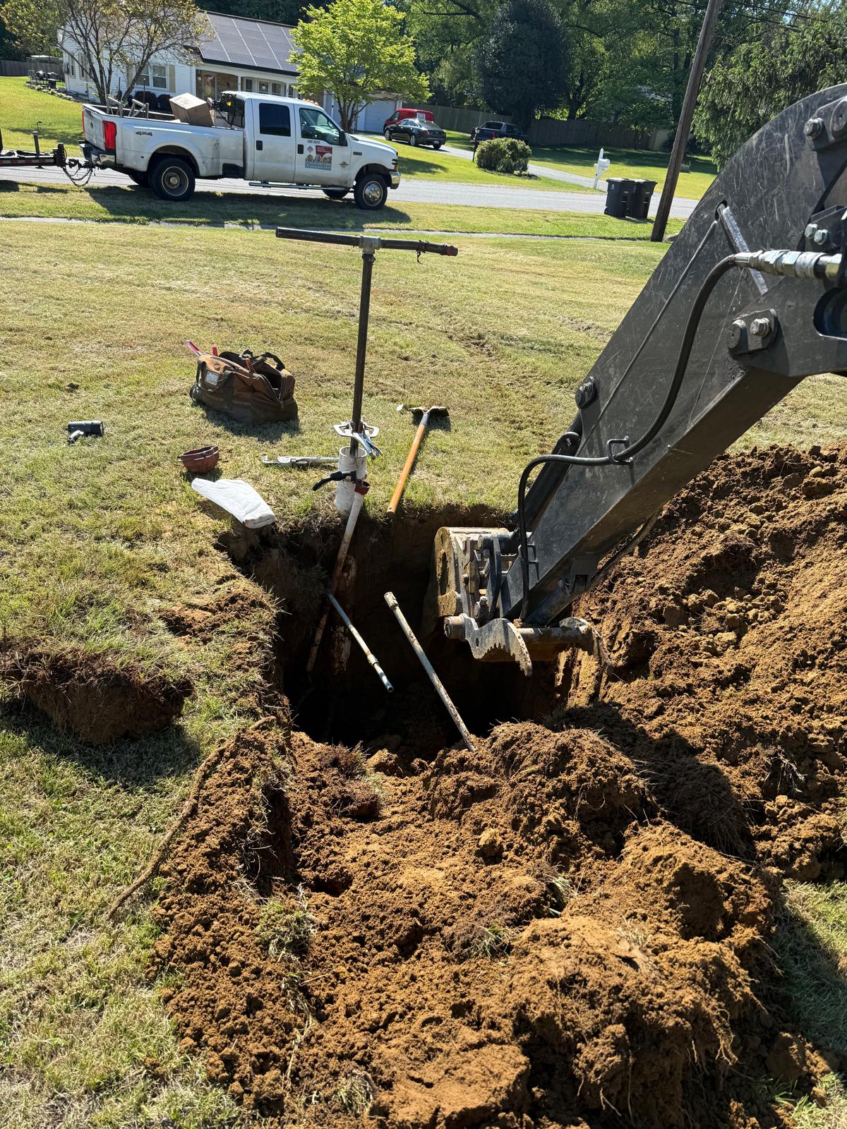 Contractor inspecting water system equipment